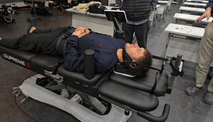 Supreme i5 heated spinal decompression therapy table with integrated rehabilitation system