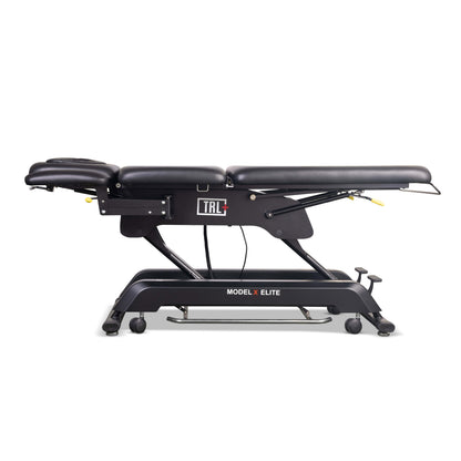     Model X Elite clinic treatment table with adjustable height and premium upholstery